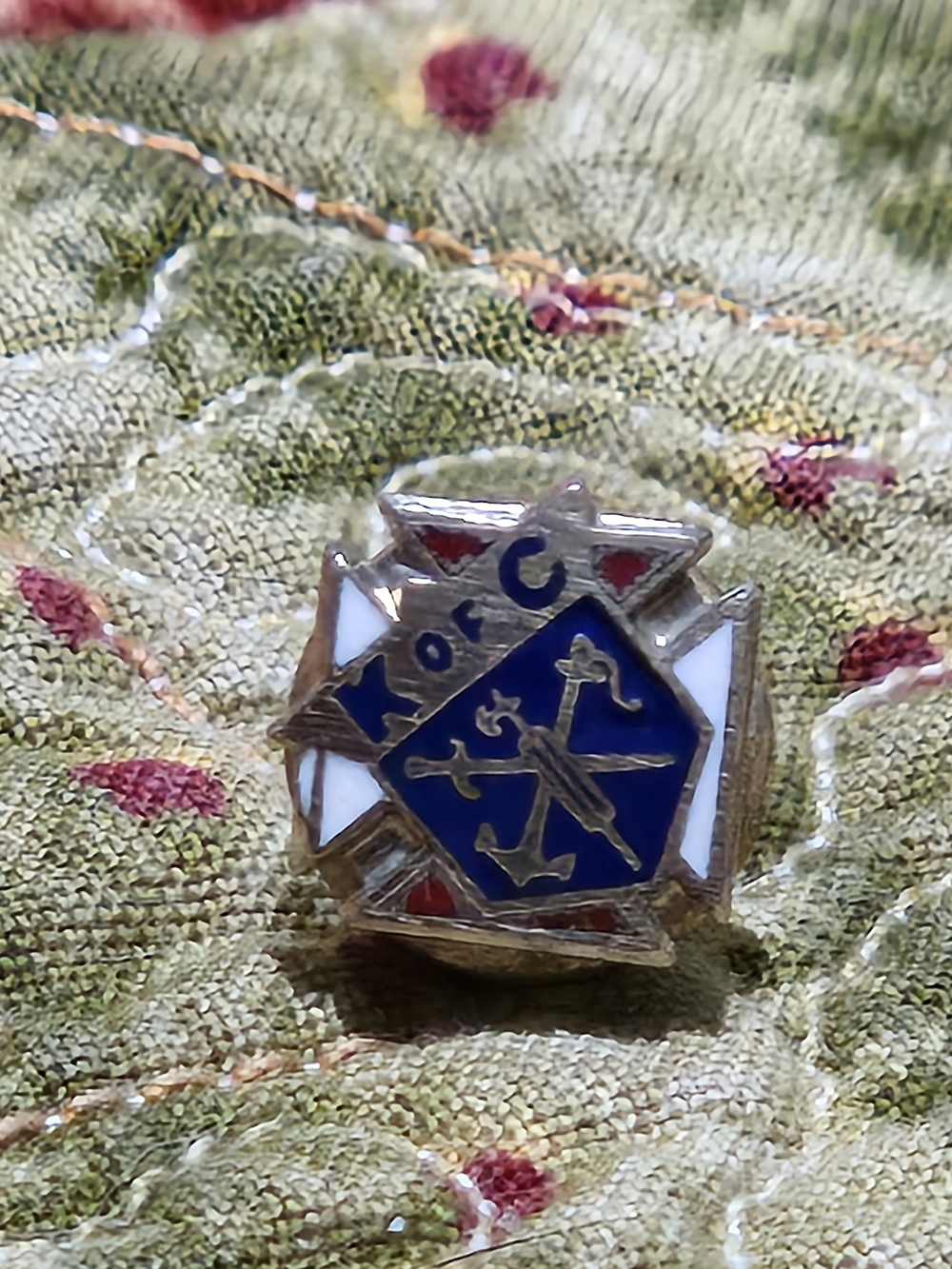 Knights of Columbus (K of C) fraternal organization pin or lapel badge.